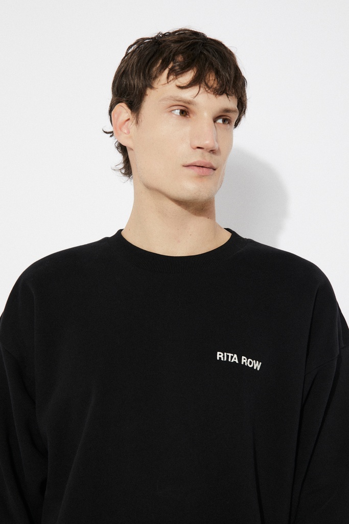 https://hotakaexchange.blob.core.windows.net/odoo/SS25%20TIMELESS%20LOW-WEB/25TC2001-SU_Black_Sweatshirt_LUCAS_SS25_4.jpg